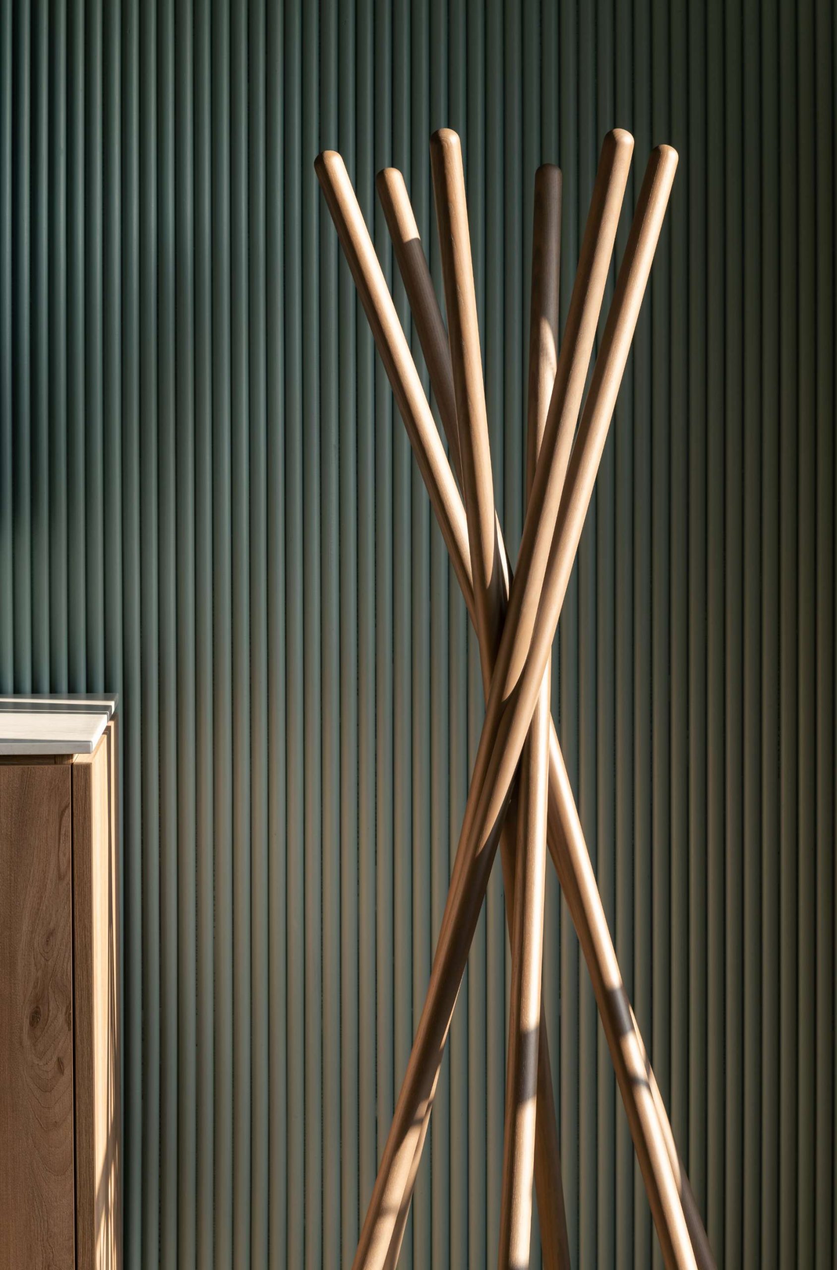 Coat rack made of wooden rods